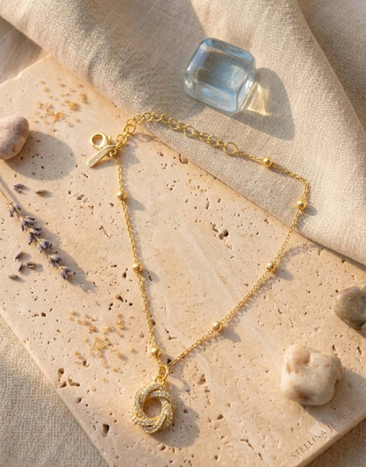 Bracciale Catenina con Ciondolo Nodo Pavé – Confezione da 12 Pezzi